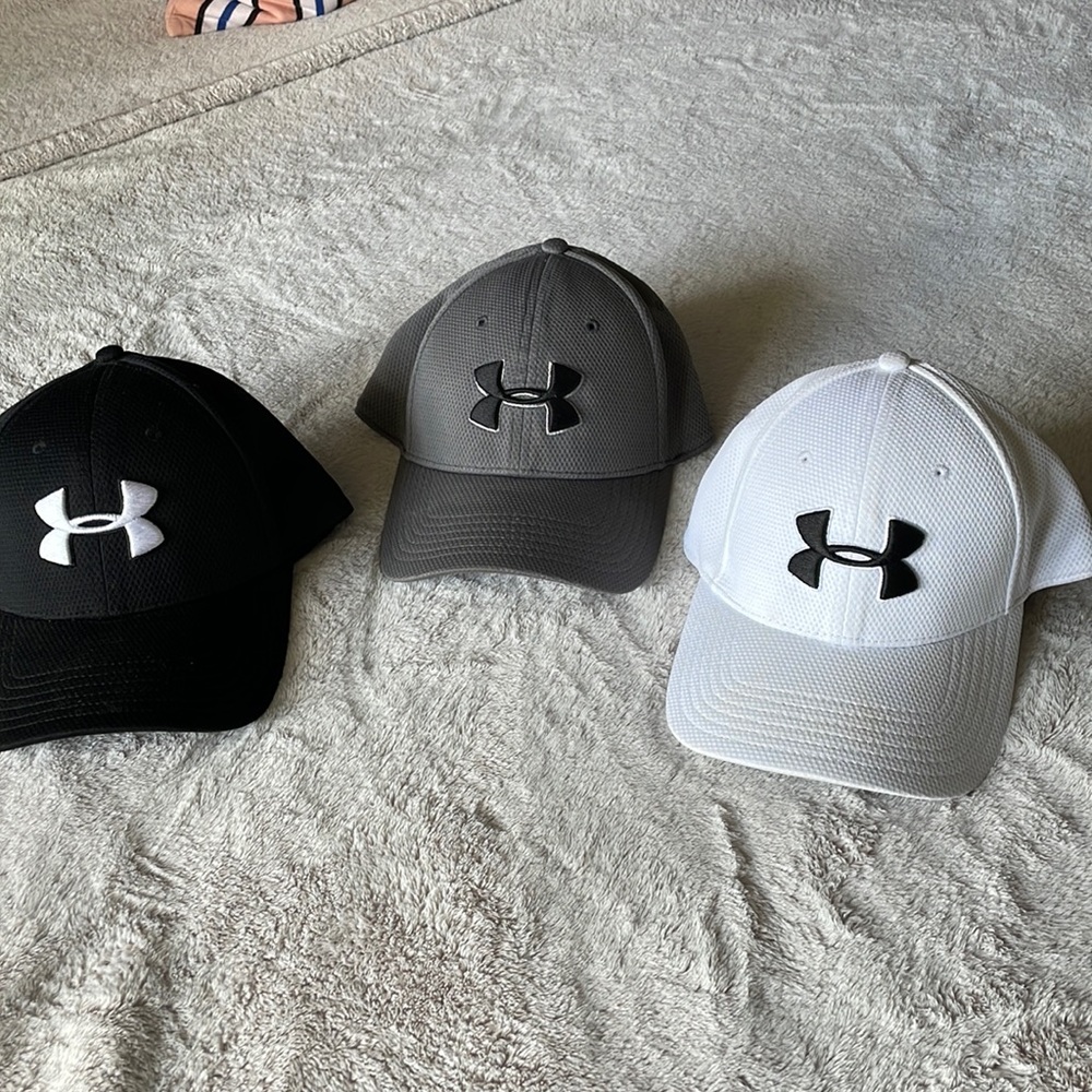 3 under armor fitted, stretch hats. Size M/L.